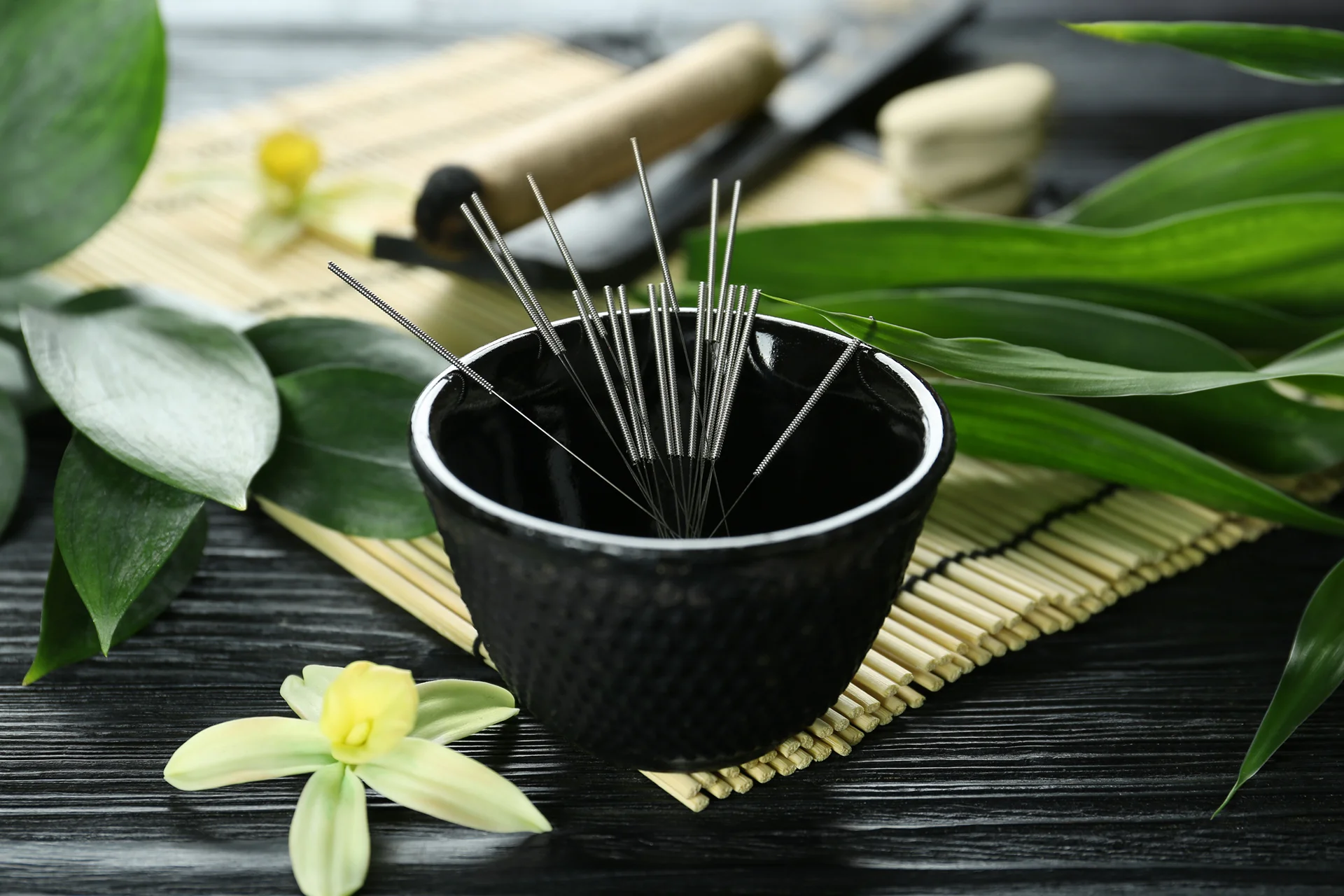 acupuncture needles in a bowl