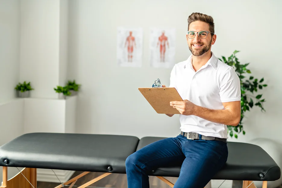 chiropractor in his clinic