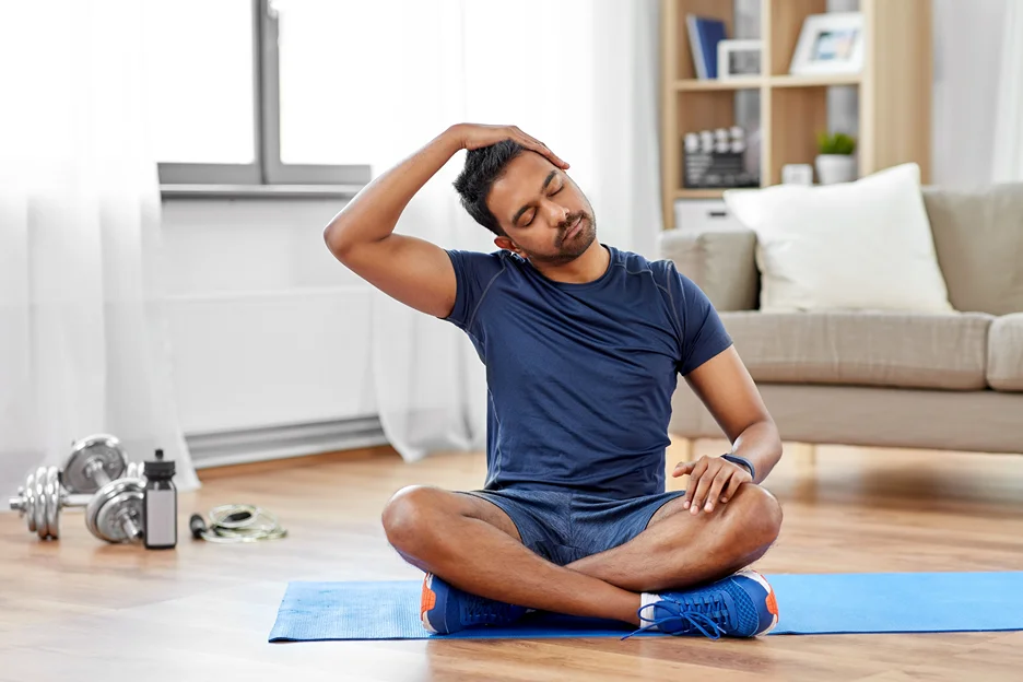 a man does neck stretching excercises