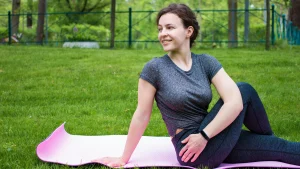 woman does piriformis stretch outdoor