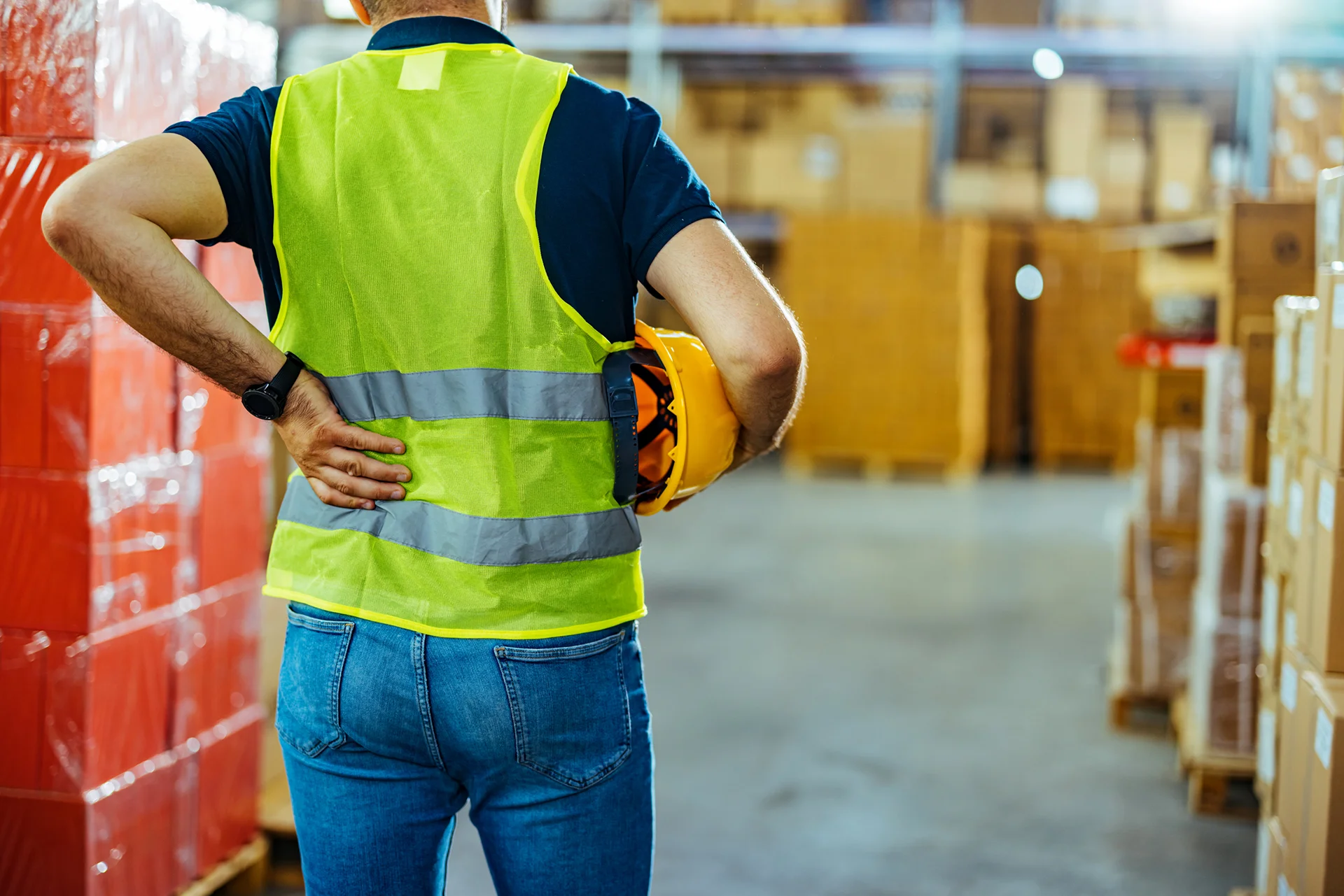 a man experienced back pain during work