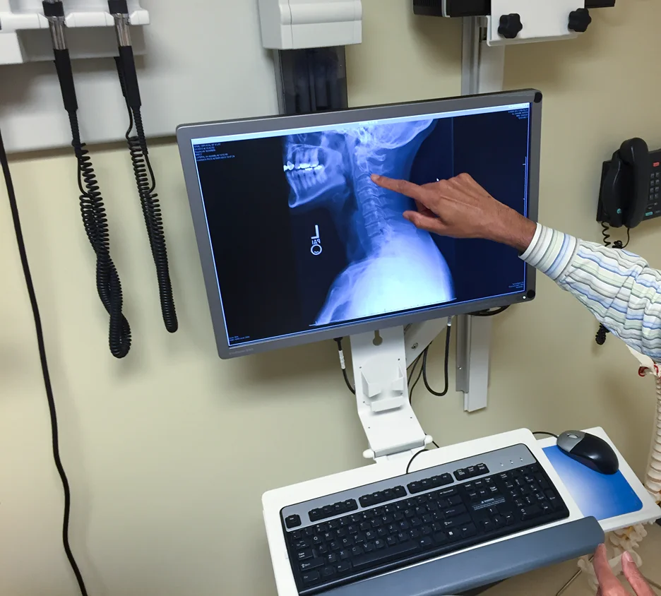 doctor explains results from x-rays scan to the patient
