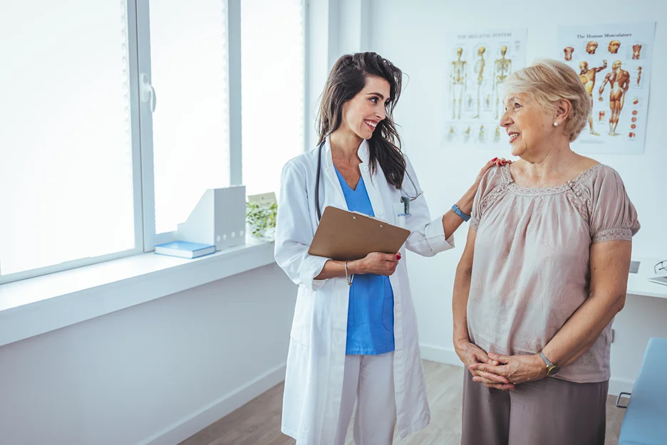 patient and doctor consult for mid back pain