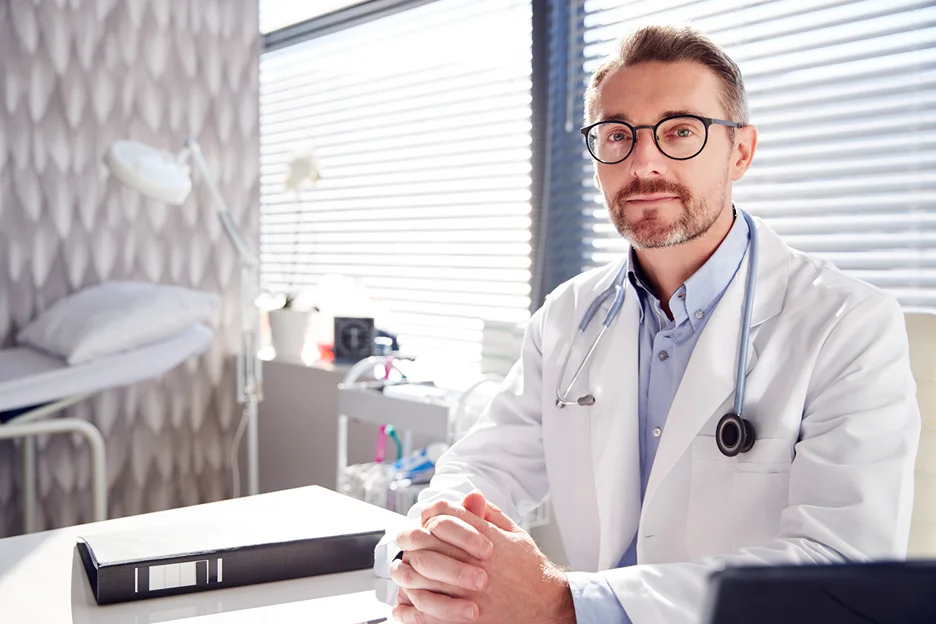 back pain doctor in his office