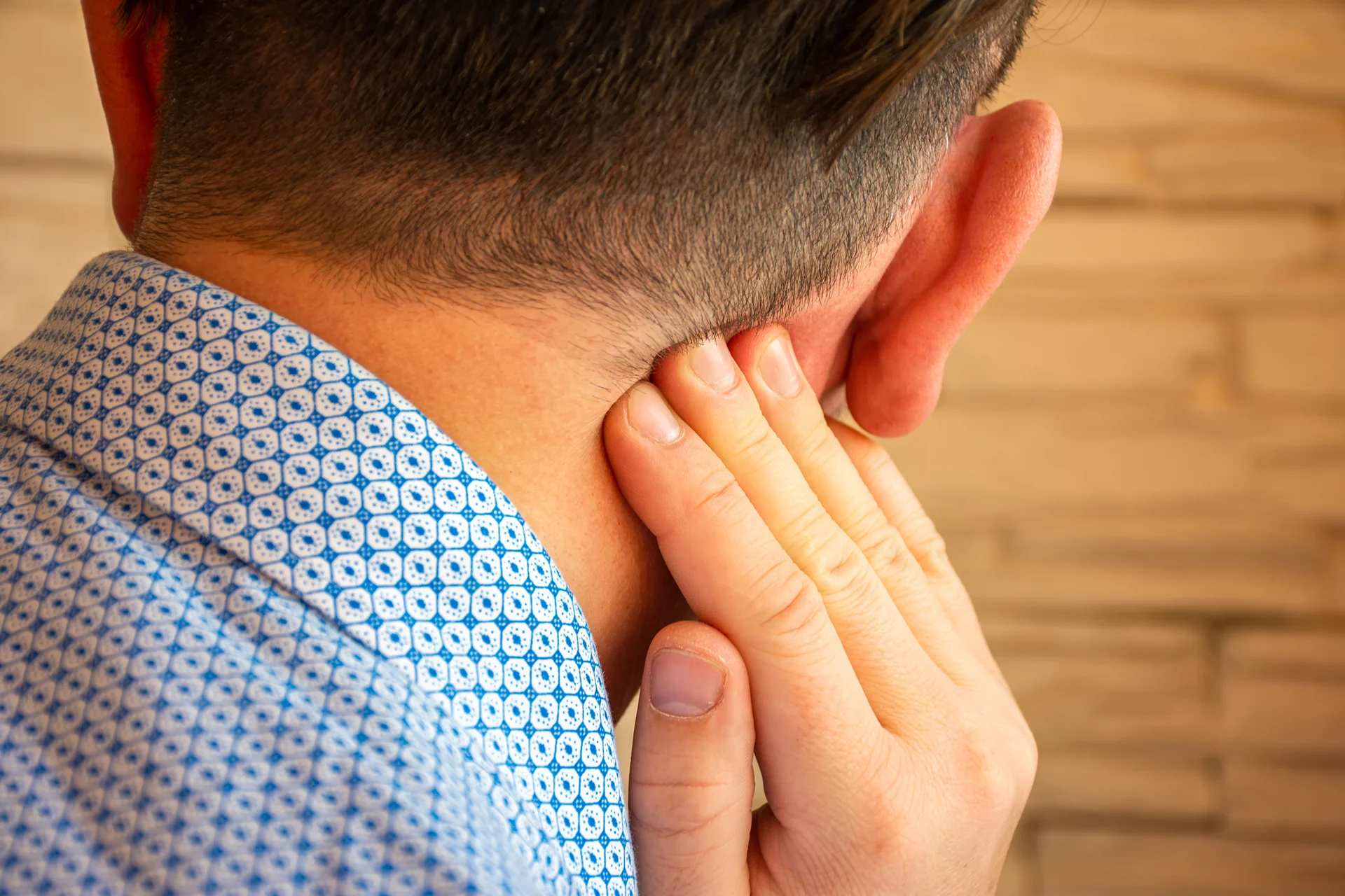 pain behind the ear and neck