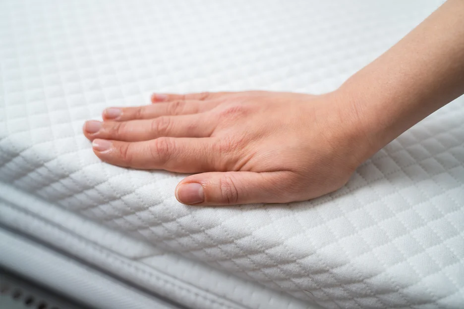hand testing mattress topper