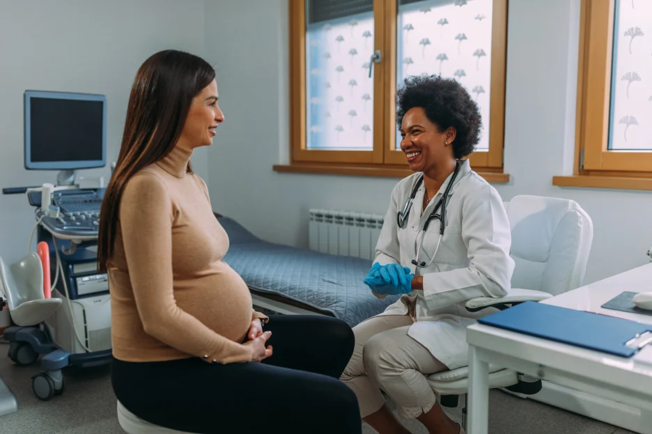 doctor and pregnant woman consult