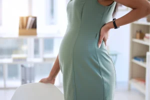 pregnant woman suffers sciatica pain
