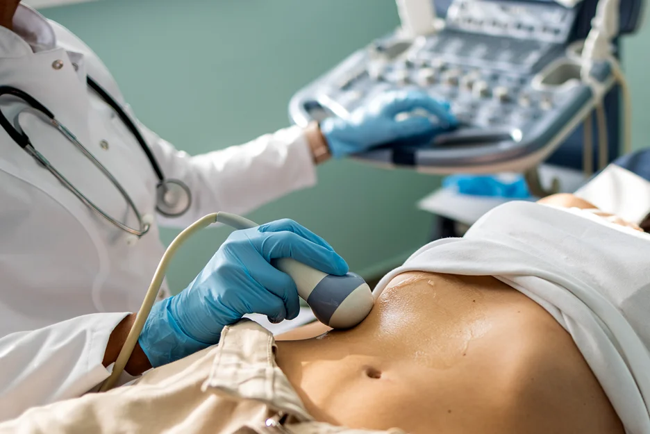 doctor perform ultrasound test on the patient