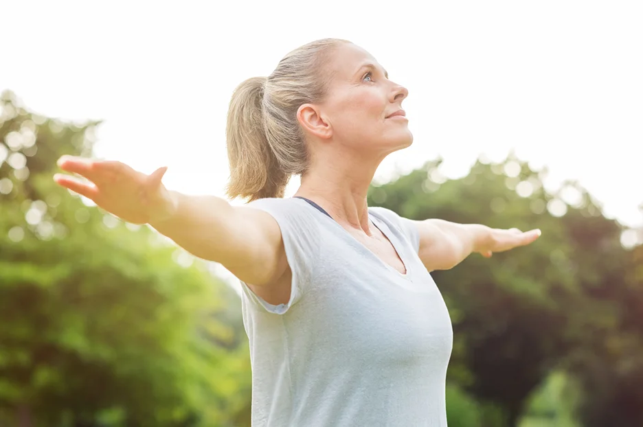 a matured woman doing yoga