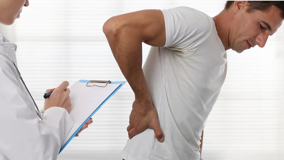 doctor and patient consultation for sciatica pain