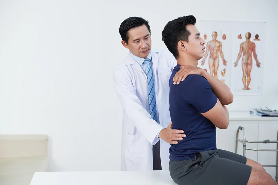 doctor and patient consultation on back pain