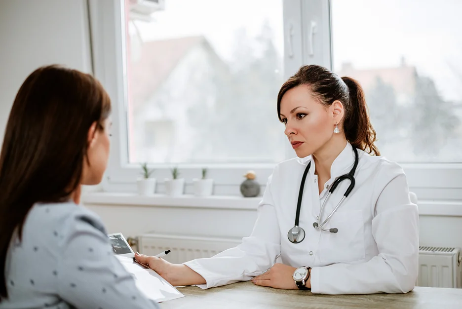 doctor and patient consult on neck pain