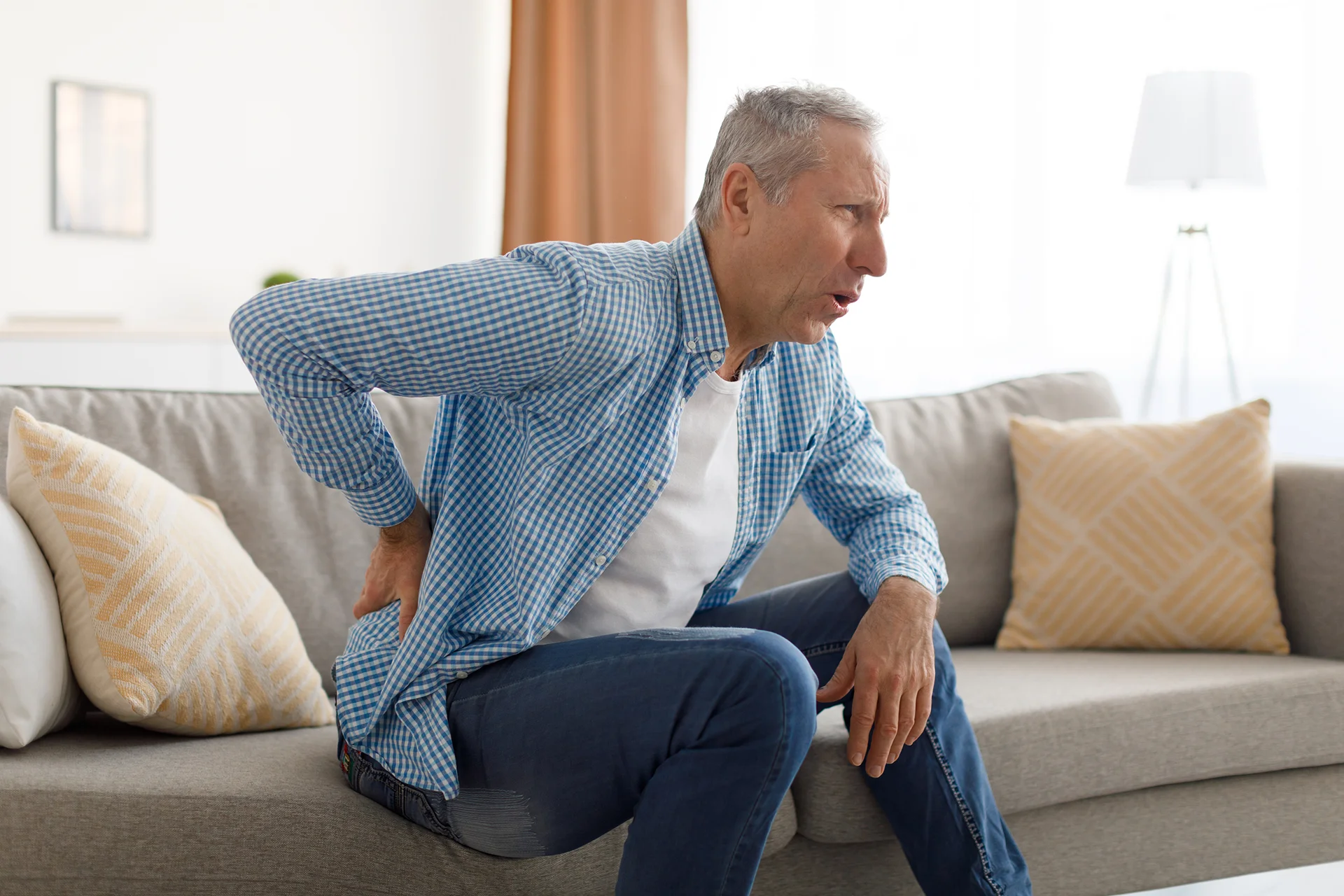 a man suffering from sciatica pain
