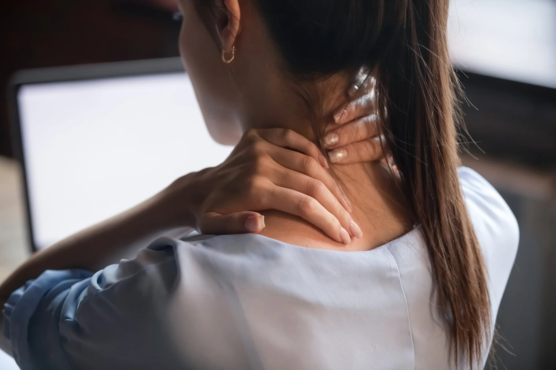 lump pain on the back of the neck near the spine