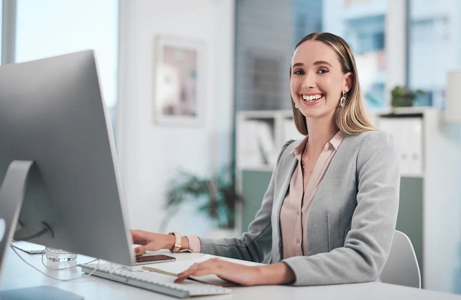 a woman sitting straight on an office chair