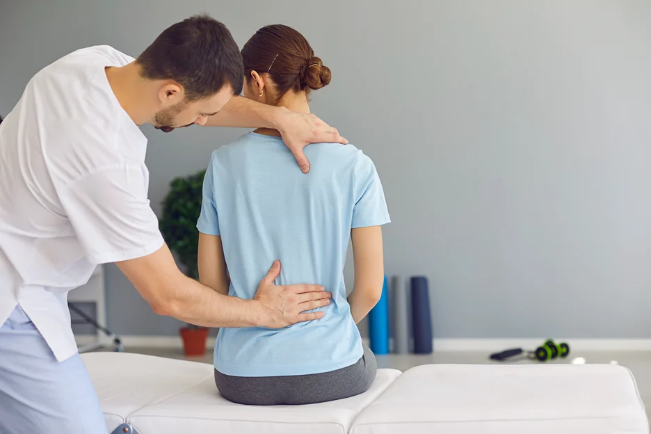 doctor and patient consult on low back back when sitting