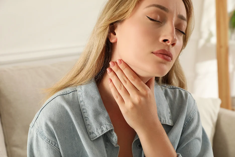 a woman has swollen lymph nodes on her neck