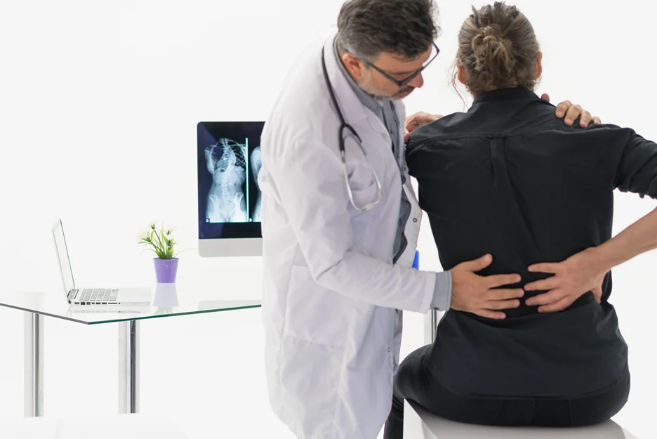 doctor and patient consult on lower back pain 