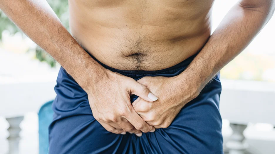 lower back and testicular pain