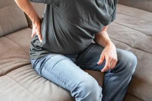 lower back and testicular pain