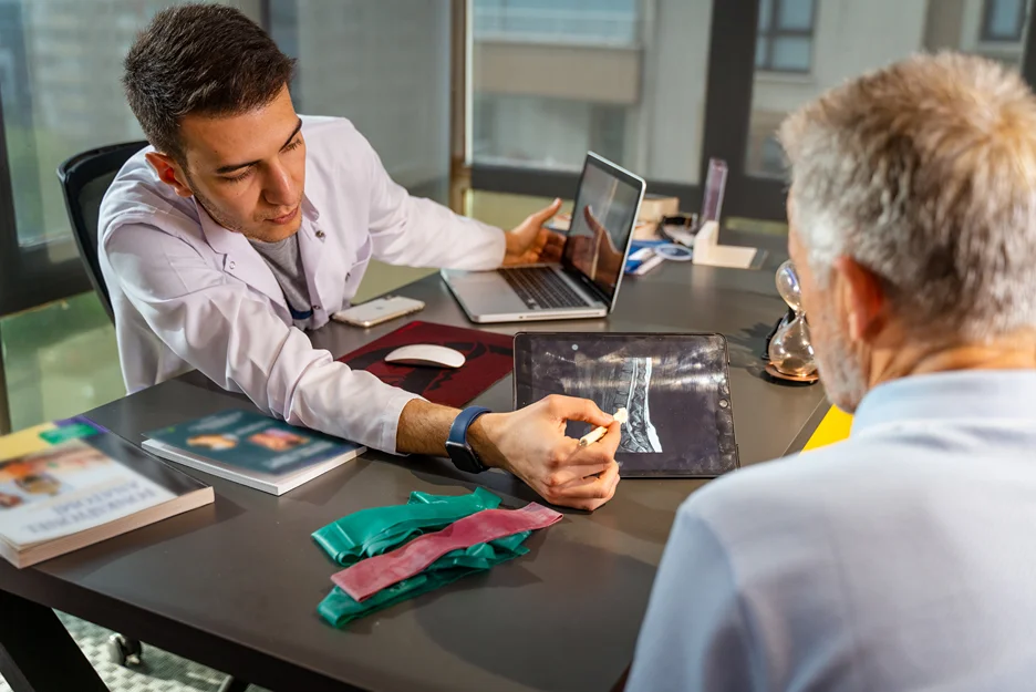 doctor and patient consultation on neck pain