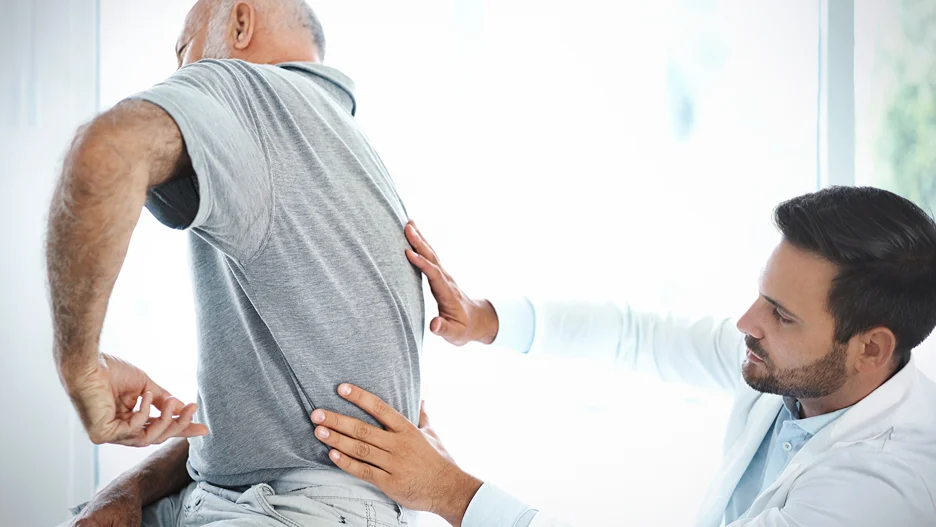 doctor and patient consult on vertebrogenic low back pain